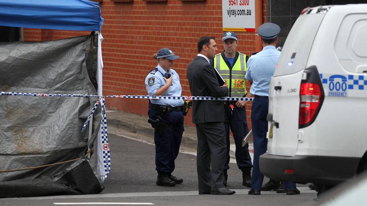 Tragic accident: Police on the scene where a man died this morning. Pictures: John Veage
