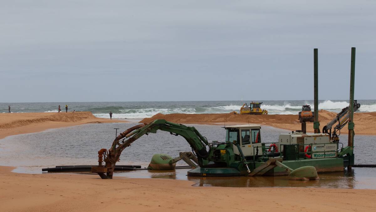 FLOOD FIX: Council's draft strategy recommends continued periodic dredging and mechanical breakouts around Narrabeen Lagoon. Picture: Geoff Jones