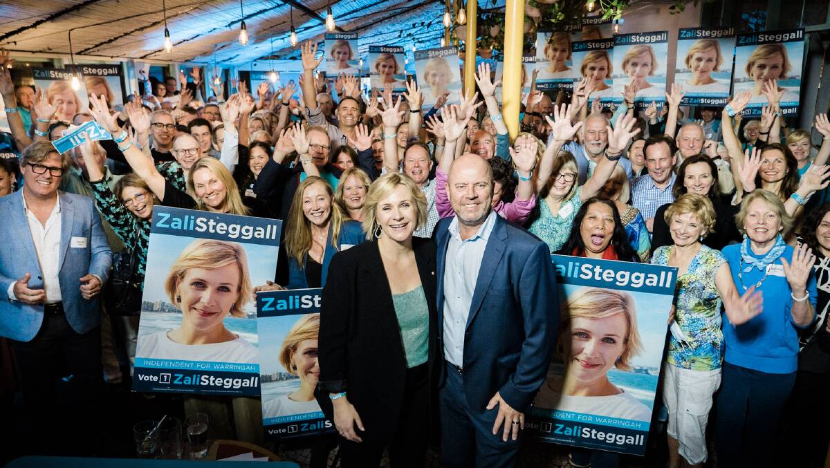 Zali Steggall and her husband Tim Irving at her campaign launch in Manly this month. Picture: Ash Berdebes