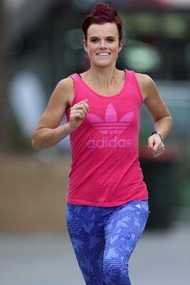 Running for a cause: Olympian and Commonwealth Games runner Eloise Wellings on a training run at Cronulla before flying to London. Picture: John Veage