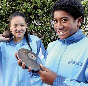 Golden arms: Grace Robinson and cousin Pita Toamotu dominated at the recent Australian Little Athletics Championships.Picture: Jane Dyson