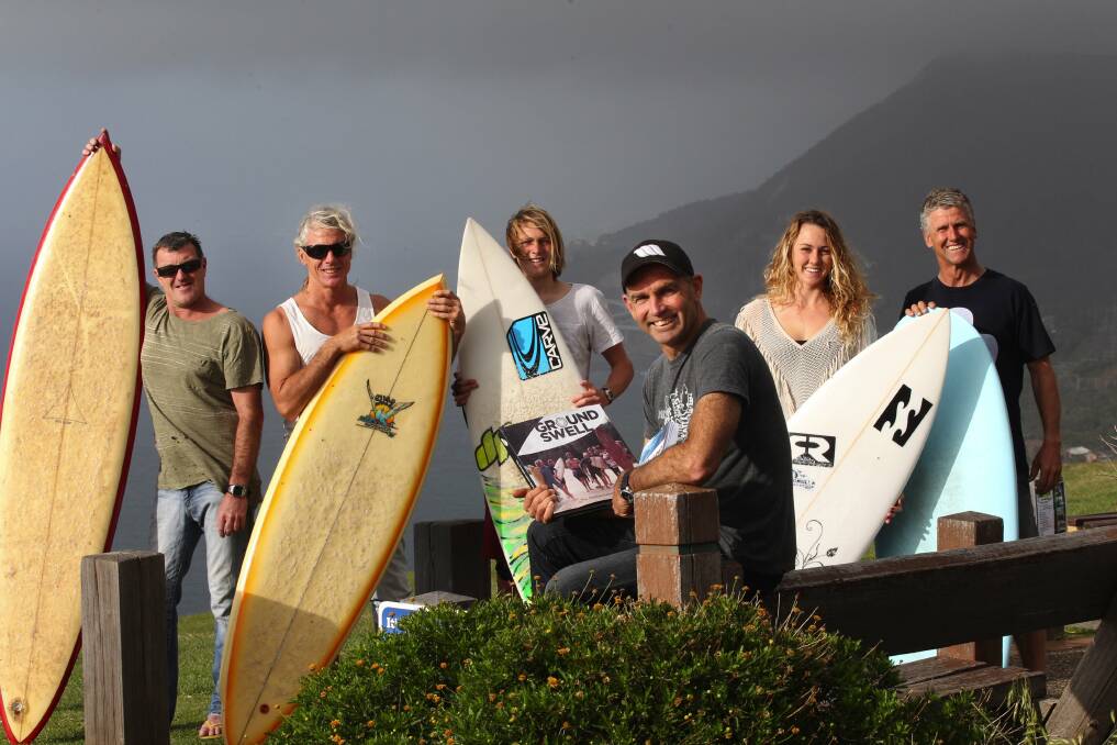 Staying power: Brett Davis (front) with fellow Christian Surfers Rob Killham, Dave Lovell, Riley Killham, Rachel Campbell and Paul Campbell ahead of their 35th anniversary book launch.  Picture: John Veage