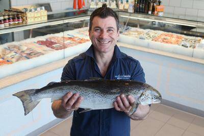 Catch of the day: Con Melas in his new Sans Souci fish shop and cafe. Picture: Chris Lane