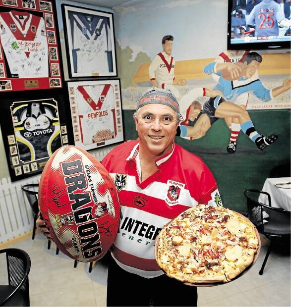 Loves his footy and Dragons: And he serves a mean pizza, too, Vince Talotta at Pizza League. Picture: Lisa McMahon