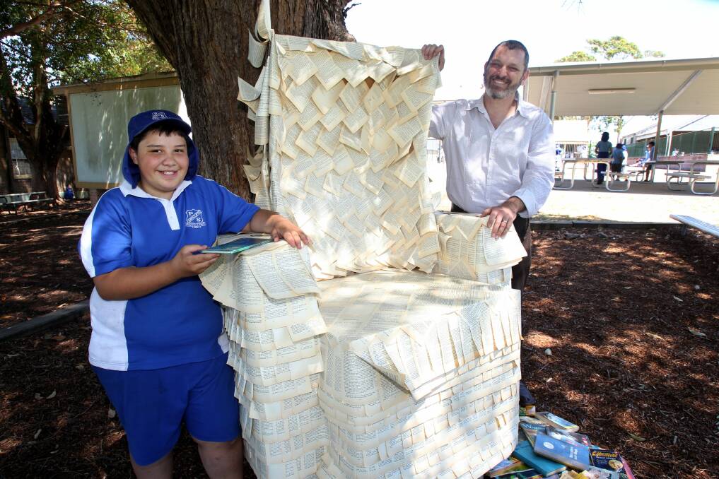 Mini-sculptors: Children from Arncliffe Public School hosted their first sculptures exhibition. Jayden Pomare and Joseph Neufield prepare the Reading Chair. Picture: Jane Dyson