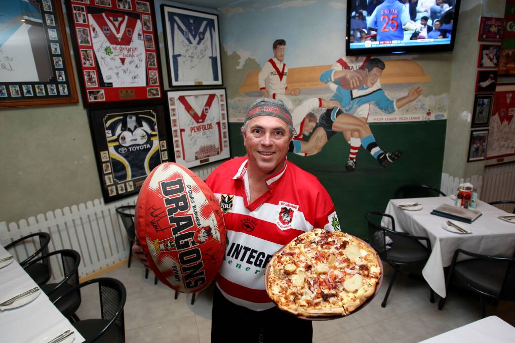 Loves his footy and Dragons: And he serves a mean pizza, too, Vince Talotta at Pizza League. Picture: Lisa McMahon