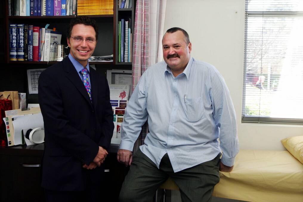 Road to recovery: Associate Professor Paul Cozzi with former patient Darryl Brohman who had nerve-sparing prostate surgery. Picture: John Veage