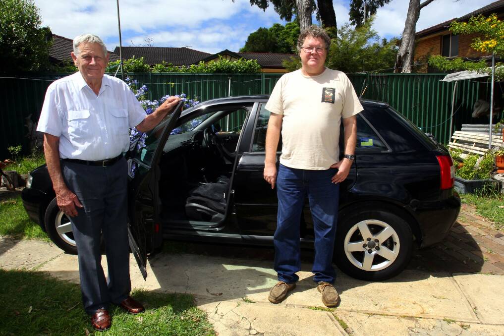 Ambulance anger: Glenn Gardner, with his father Cyril, next to the car his aunt,  Marjorie Shaw, 92, was getting into when she fell, before waiting 1 hour 37 minutes for paramedics to arrive. Picture: Lisa McMahon