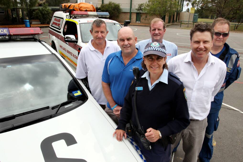 10.12.12. CAPTION: Driving course for students results in lowering the number of injured in accidents. Rotary member Martin Tabone, Stuart Cox (Woolooware High School), Mark Daltone from Trent Driving, Senior Constable Vicki Shipley, Mark Stuart and paramedic Bruce Tindale. Picture: Jane Dyson