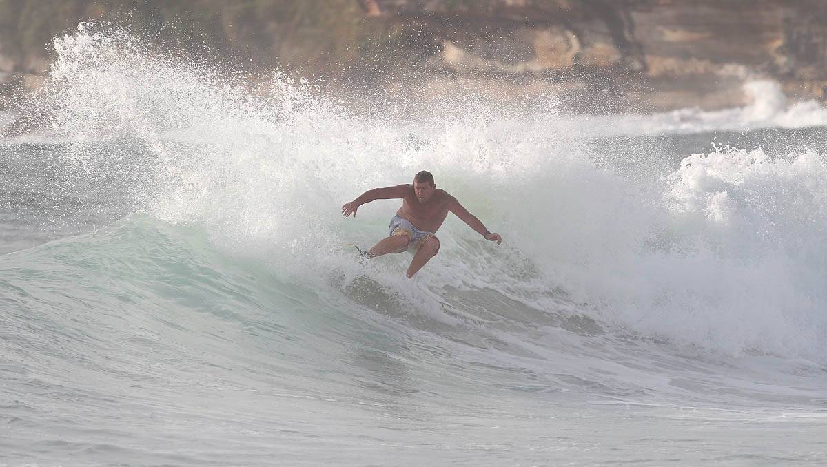 The" Surfing kid"-Matt Brown.Picture John Veage
