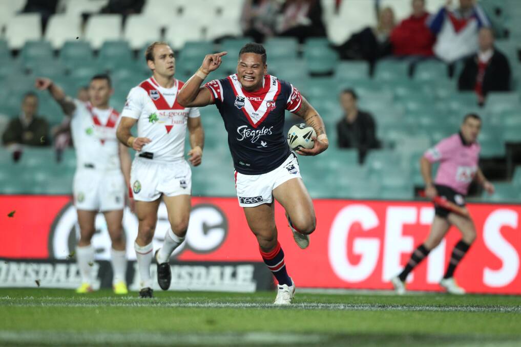 Joseph Leilua (centre) in an NRL match in August between Sydney Roosters and St George Illawarra Dragons. Picture:  Anthony Johnson