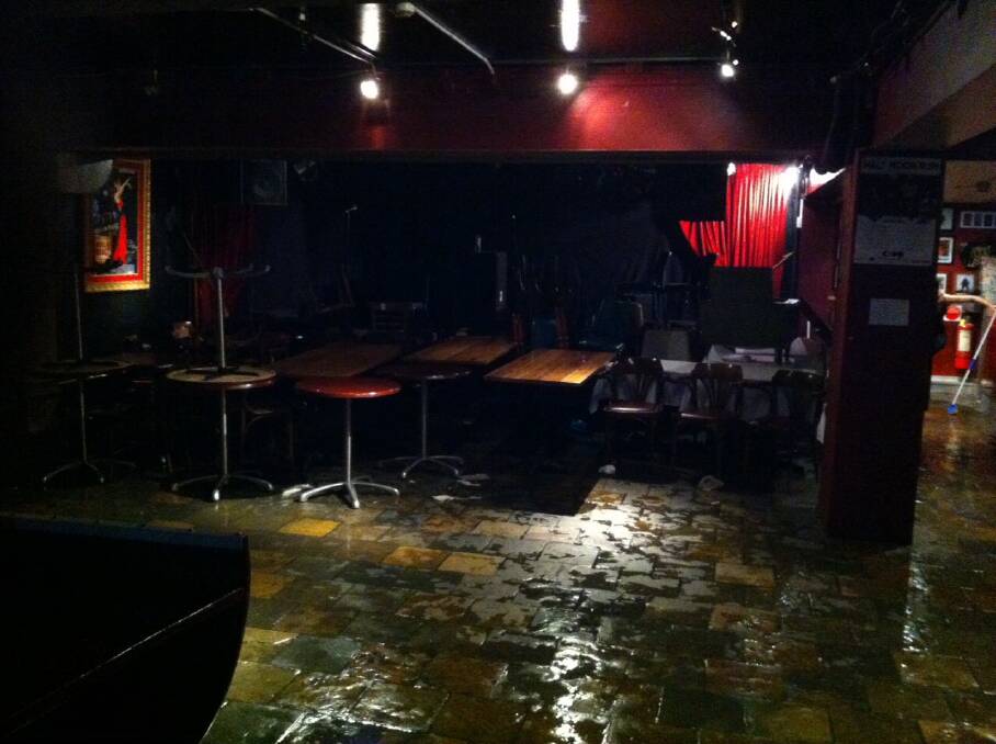 The show can't go on: The damage half way through the clean up at the Brass Monkey. Picture : Anthony McDonald