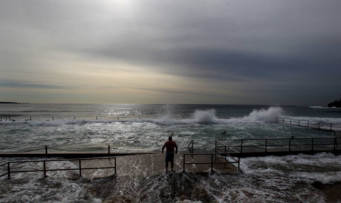 Surf’s up: The tide swept into Cronulla last year during the king tide. Picture: Chris Lane.